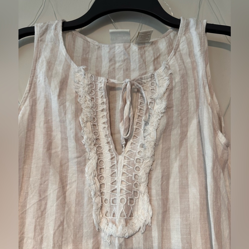 A lovely pink/ white striped sundress, perfect for the beach or a casual day out